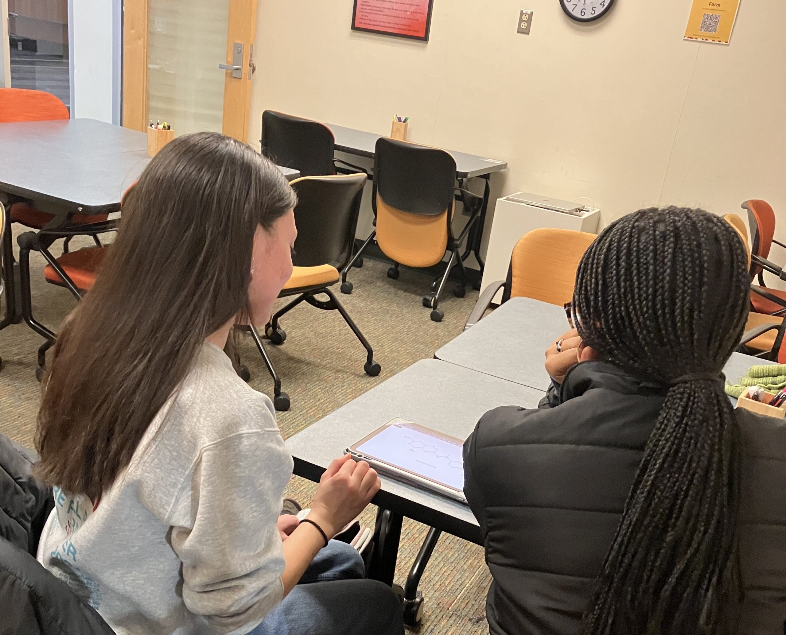 Students engaged in a tutoring session
